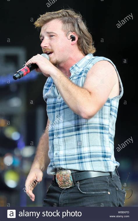 Download this stock image: WANTAGH, NY - JUL 20: Morgan Wallen performs ...