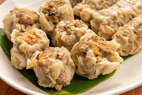 White Dish Of Asian Steam Dumplings Or Dim Sum A Famous Chinese Food