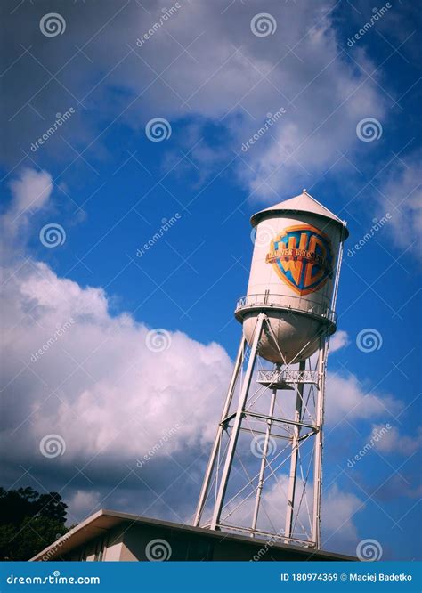 Warner Bros Water Container Stand and Blue Sky with Some Clouds ...