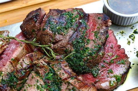 Premium Photo Portion Of Grilled Beef Chateaubriand With Herbs