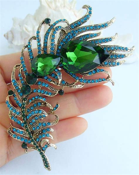 FEATHER BROOCH