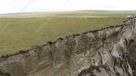 Flying Over Melting Permafrost Cliff Alaska Stock Video Clip K011