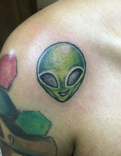 15 Alien Head Tattoo Designs That Are Out of This World - Psycho Tats