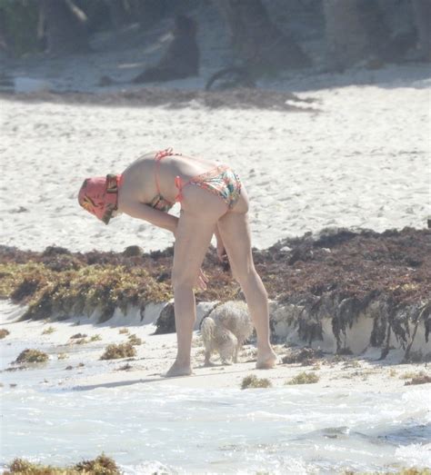 Rose McGowan Wears A Multi Colored Bikini As She Hits The Beach In