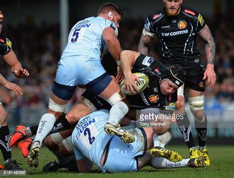 Thomas Waldrom Of Exeter Chiefs Is Tackled By Darren Barry And Niall