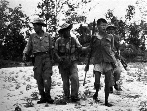 French Indochina Soldiers With A Captured Vietminh Soldier Pin By