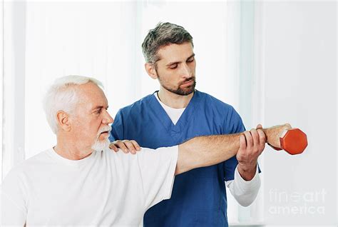 Physiotherapist And Patient Photograph By Peakstock Science Photo