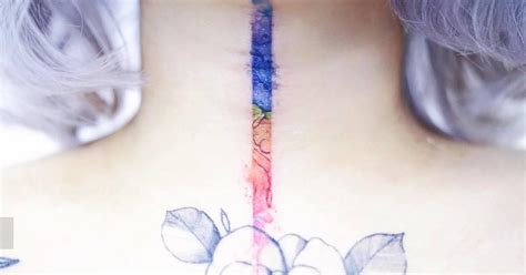 Watercolor Style Spectrum Tattoo Located On The Throat