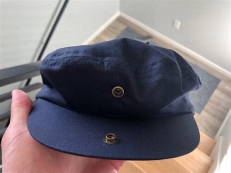 Why Do Flat Caps Have Snap Buttons On The Brim Explained Work Wear