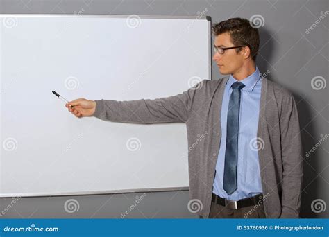 Businessman Pointing At Whiteboard In Office Stock Photo Image Of