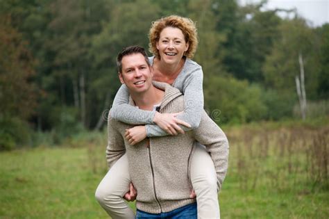 Cheerful Couple Enjoying Life Outdoors Stock Image Image Of Caucasian