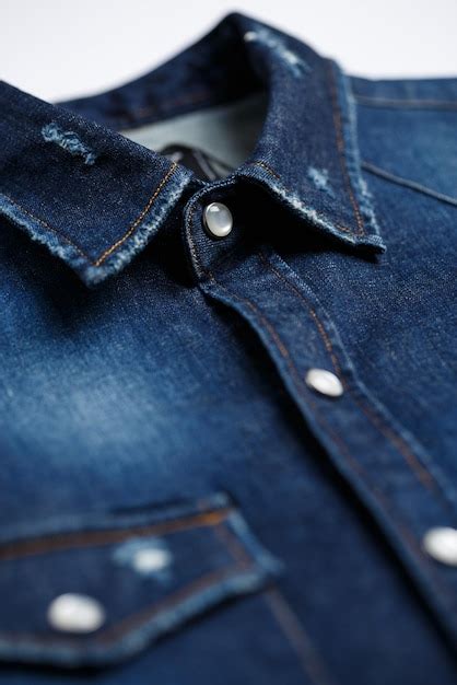 Premium Photo Vertical Closeup Shot Of A Denim Jacket On A White Background