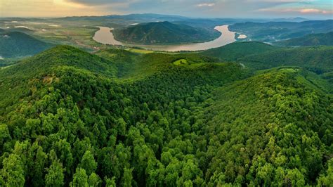 an aerial view of the mountains and river