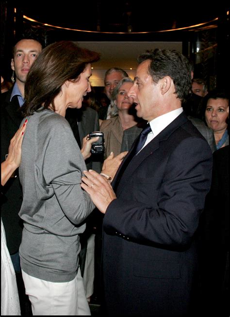 Photo Nicolas Sarkozy et Cécilia Attias fêtent la victoire à la