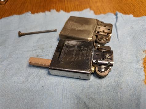 Stuck flint tube? Two minute fix. : r/Zippo