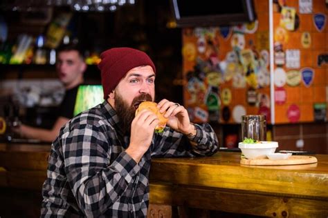 Premium Photo Enjoy Taste Of Fresh Burger Hipster Hungry Man Eat