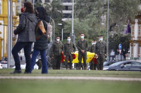 El homenaje a la bandera de España por el centenario de las Unidades