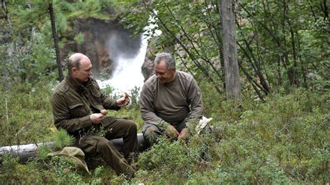 Vladimir Putin boats, sunbathes and picks mushrooms in his Russian ...