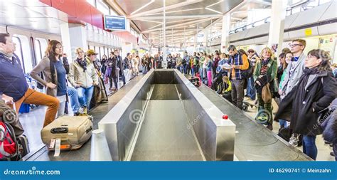 Passengers At The Baggage Carousel At The Airport Tegel Editorial Photo