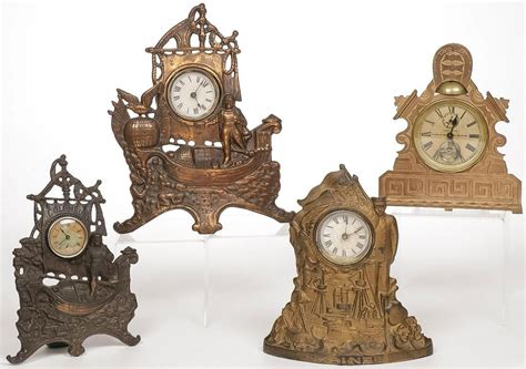 Four Novelty Mantle Clocks Auction