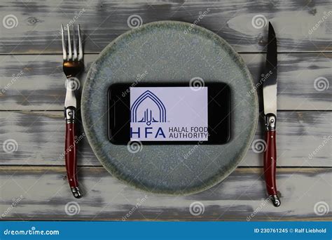 Closeup Of Smartphone With Logo Lettering Of Hfa Halal Food Authority