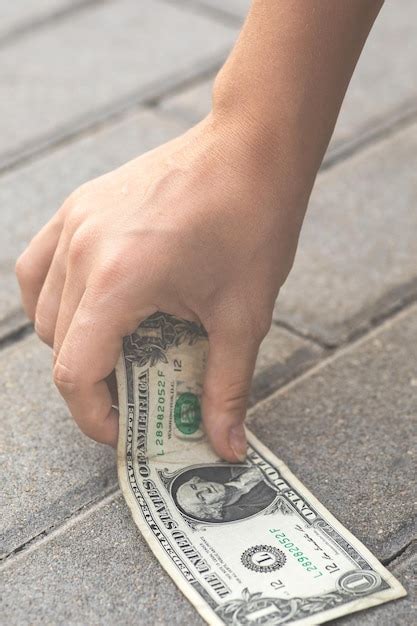 Premium Photo Cropped Hand Of Man Holding Paper Currency