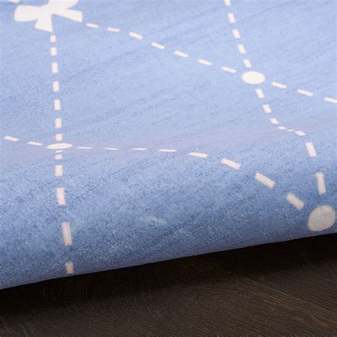 Modest Bow Blue Rugs | Rooms to Go