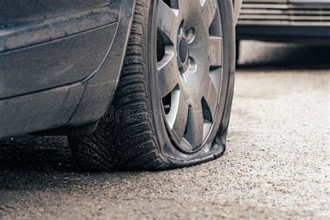 Flat Car Tire Close Up Punctured Wheel Stock Photo Image Of Problem