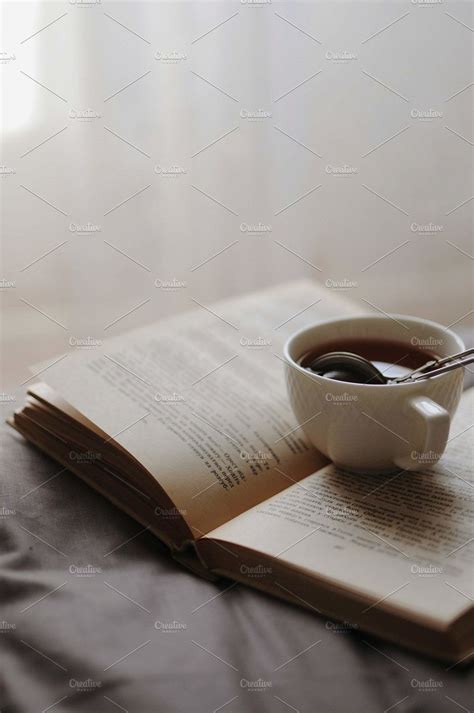 Cozy Home Still Life Cup Of Hot Tea Containing Indoors Book And Read