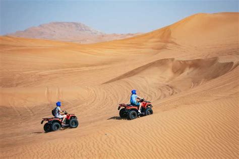 Dubai Half Day Desert Safari Camel Ride Quad Bike Option GetYourGuide