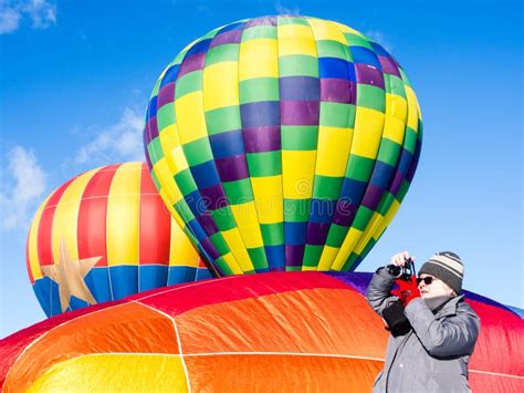 Woman Taking Photos Of Hot Air Balloons Taking Off Editorial Image Image Of Balloons Tourist