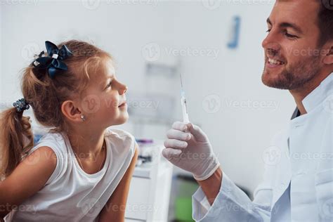 Blood sampling. Little girl is in the clinic with doctor 15227872 Stock