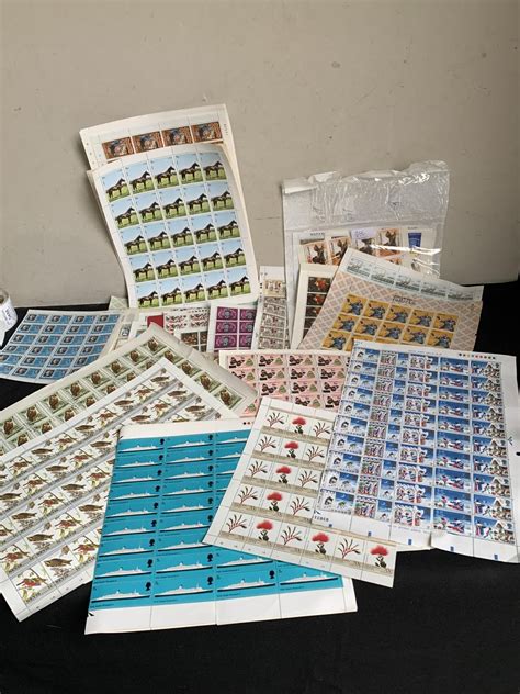 Over Sheets Of Mint Stamps