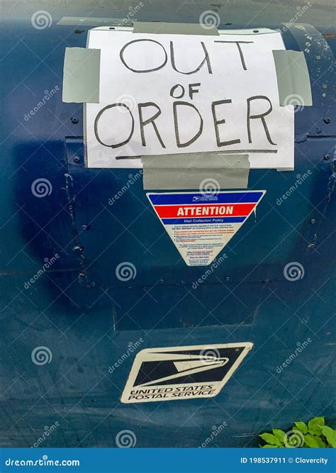 USPS Postal Drop Box with Hand Written Out of Order Sign on it in Front