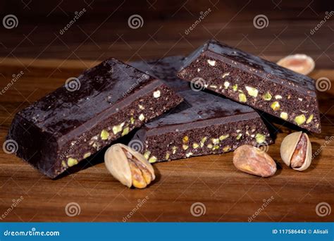 Dark Chocolate With Nut Of Pistachios On Wooden Stock Image Image Of