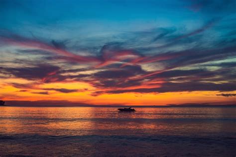 Premium Photo Gold Sunset Over Beach With Wave Splashes In Summer Of