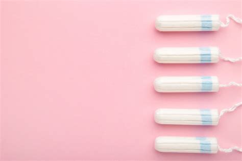 Premium Photo Menstrual Tampons On A Pink Background