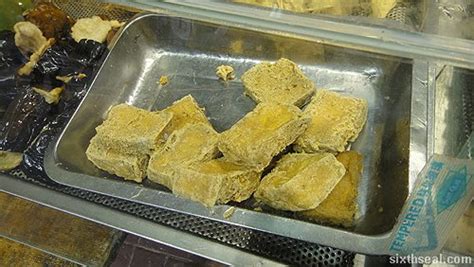 Eating stinky tofu in Hong Kong – sixthseal.com