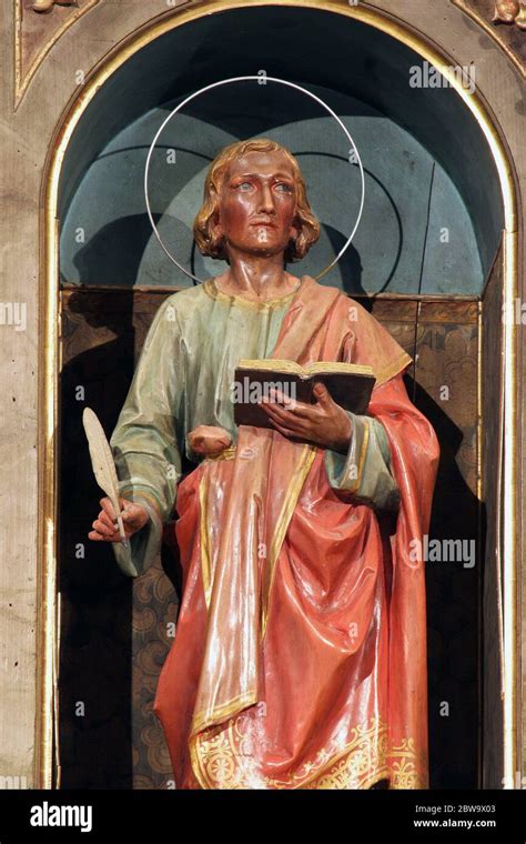 St. John the Evangelist statue on the main altar at St. Peter's Church ...