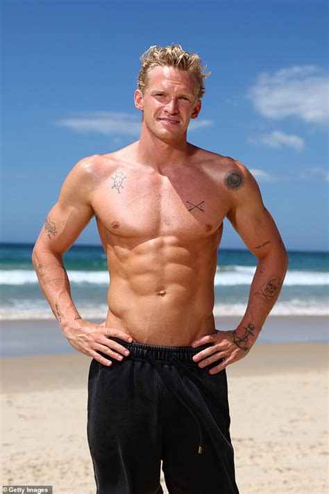 Cody Simpson Shows Off His Ripped Physique As He Poses Alongside Lifesavers On The Gold Coast