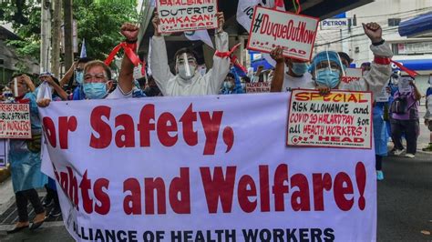 Exhausted, Filipino nurses battle COVID and resignations - World Today News