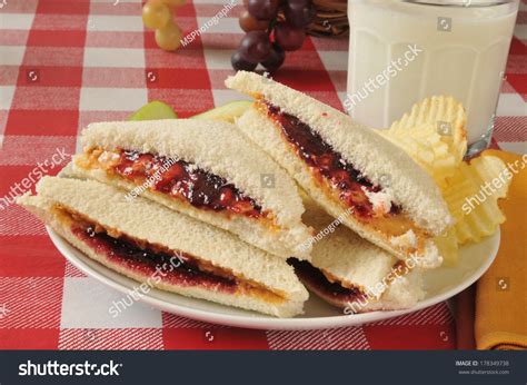 Peanut Butter And Jelly Sandwich With The Crust Trimmed Off Stock Photo 178349738 : Shutterstock