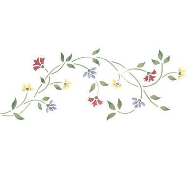 a white wall with flowers and leaves on it