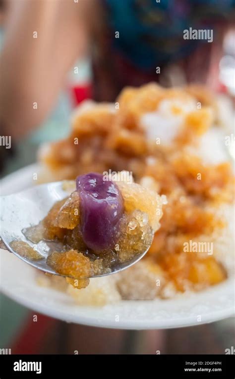 Eating Shaved Ice With Colorful Dessert Stock Photo Alamy