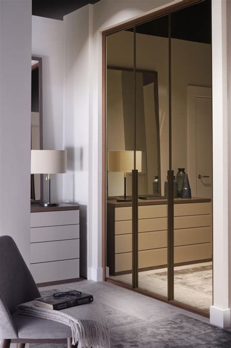 Bronze Powder Coated Hinged Doors With Matching Lined Handles Mirrored