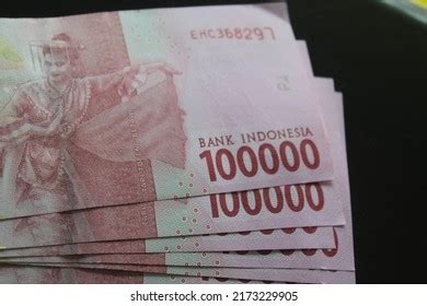 rear view   thousand rupiah stock photo