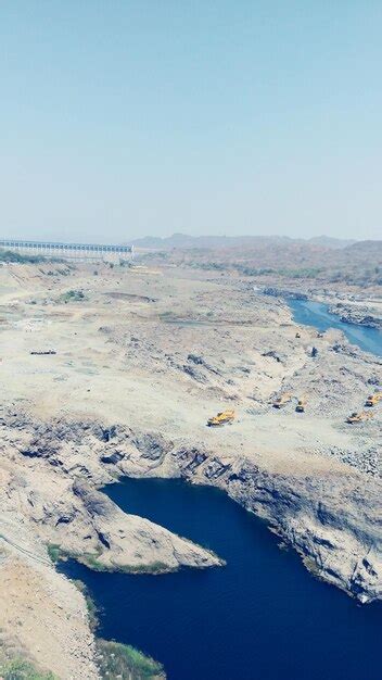 Premium Photo | Scenic view of narmada river dam against clear sky