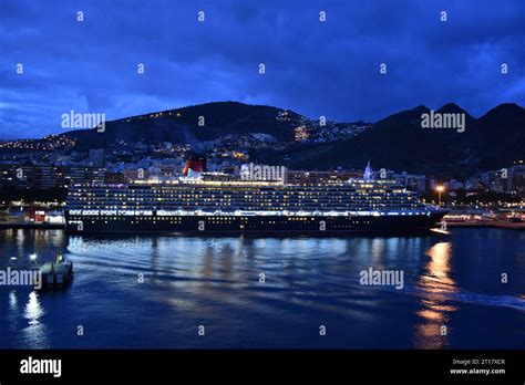 Cruise ship at night in harbour Stock Photo - Alamy