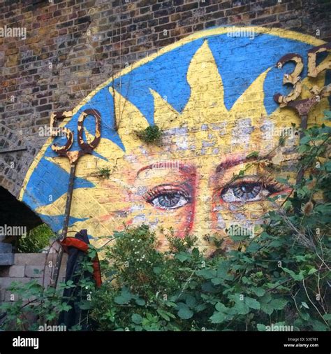 Overgrown graffiti art mural close to the River Lea in Clapton, London ...