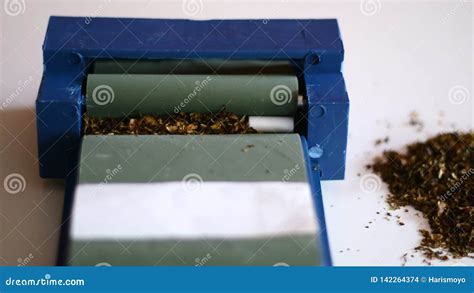 Cigarette Rolling Machine stock photo. Image of tingwe - 142264374